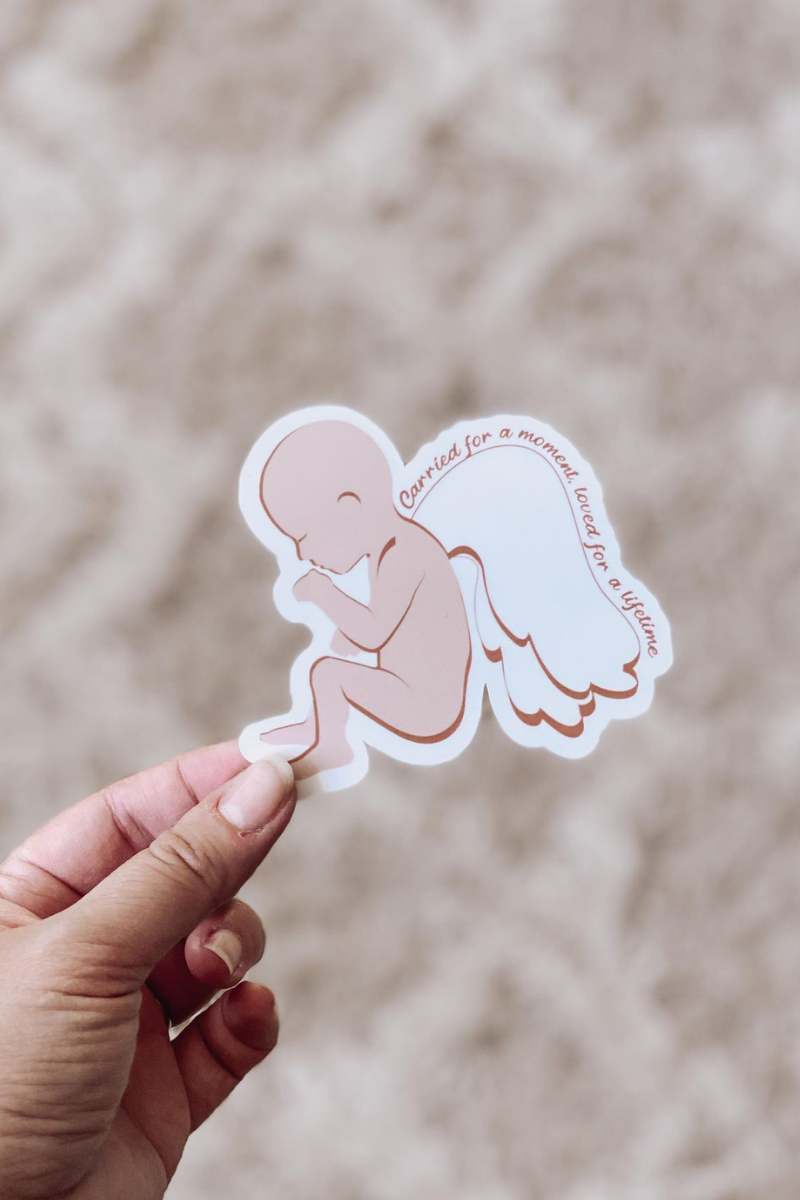Sticker of Baby with wings with text Carried For A Moment Loved For a Lifetime